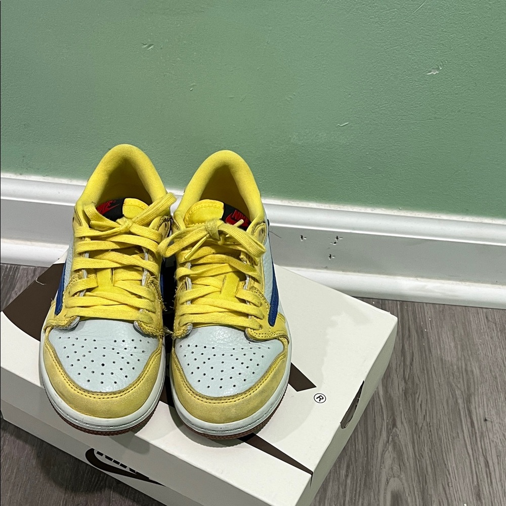 Travis Scott Kids Yellow and Blue Sneakers has a lot of life to them